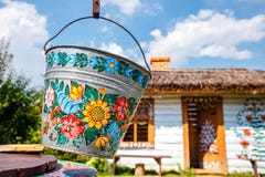 Zalipie, Poland, August 19, 2018: A bucket over a well in the colorful village - Zalipie, Poland. It is known for a local custom stock photography Zalipie, Poland, August 19, 2018: A bucket over a well in the colorful village - Zalipie, Poland. It is known for a local custom stock photography