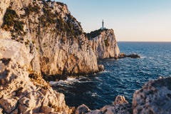 Zmierzch w Lefkada przy przylądka Lefkatas latarnią morską, ostrość na th obrazy royalty free Zmierzch w Lefkada przy przylądka Lefkatas latarnią morską, ostrość na th obrazy royalty free
