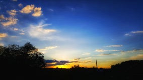 Zonsondergang met wolken stock fotografie Zonsondergang met wolken stock fotografie