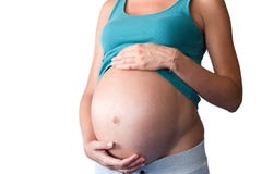 Zwangere vrouw met mooie die buik op witte achtergrond wordt geïsoleerd stock afbeeldingen Zwangere vrouw met mooie die buik op witte achtergrond wordt geïsoleerd stock afbeeldingen
