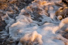 A água espirra com a espuma imagens de stock A água espirra com a espuma imagens de stock