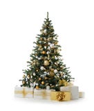 A árvore de Natal decorada com as bolas artificiais do ouro do ornamento dourado dos retalhos e o presente grande apresenta pelo Imagem de Stock A árvore de Natal decorada com as bolas artificiais do ouro do ornamento dourado dos retalhos e o presente grande apresenta pelo Imagem de Stock
