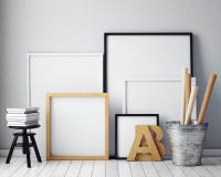 Åtlöje upp affischramar i hipsterinrebakgrund royaltyfri bild Åtlöje upp affischramar i hipsterinrebakgrund royaltyfri bild