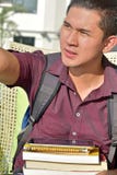 Étudiant impassible de garçon image libre de droits Étudiant impassible de garçon image libre de droits