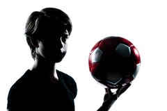 Één holding die van het het meisjessilhouet van de tienerjongen voetbalfootba tonen royalty-vrije stock foto Één holding die van het het meisjessilhouet van de tienerjongen voetbalfootba tonen royalty-vrije stock foto