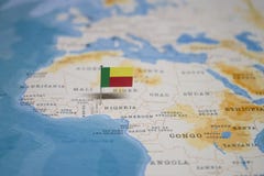 Η σημαία του Μπενίν στον παγκόσμιο χάρτη στοκ εικόνες Η σημαία του Μπενίν στον παγκόσμιο χάρτη στοκ εικόνες