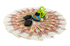 λευκό μετρητών ανασκόπηση&s Αυτοκίνητο παιχνιδιών και κλειδιά αυτοκινήτων στα χρήματα Bill 5 χιλιάες ρούβλια, που διαδίδονται έξω στοκ εικόνες λευκό μετρητών ανασκόπηση&s Αυτοκίνητο παιχνιδιών και κλειδιά αυτοκινήτων στα χρήματα Bill 5 χιλιάες ρούβλια, που διαδίδονται έξω στοκ εικόνες