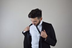 Νέα συναισθηματική πίεση επιχειρηματιών και τρυπημένος στοκ εικόνα Νέα συναισθηματική πίεση επιχειρηματιών και τρυπημένος στοκ εικόνα