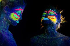 Portrait of a girl with ultraviolet make-up profile and raised head. stock photo Portrait of a girl with ultraviolet make-up profile and raised head. stock photo