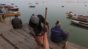 Ежедневная жизнь в Ганге Ghat Ежедневная жизнь в Ганге Ghat