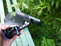 Навигатор автомобиля с нагруженными картами городов и стран стоковое фото Навигатор автомобиля с нагруженными картами городов и стран стоковое фото