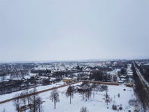 Панорама Suzdal в зиме Взгляд колокольни rizopolozhensky монастыря, часть золотого кольца ЮНЕСКО России стоковая фотография rf Панорама Suzdal в зиме Взгляд колокольни rizopolozhensky монастыря, часть золотого кольца ЮНЕСКО России стоковая фотография rf