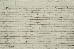 Старая кирпичная стена с серой текстурой предпосылки краски стоковое изображение Старая кирпичная стена с серой текстурой предпосылки краски стоковое изображение