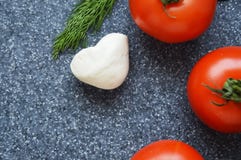 Томаты на серой предпосылке стоковые фото Томаты на серой предпосылке стоковые фото