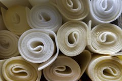 Текстура Rolls белая и желтая пенистого каучука строительного материала Предпосылка поверхности листа пены полистироля герметизир стоковое фото rf Текстура Rolls белая и желтая пенистого каучука строительного материала Предпосылка поверхности листа пены полистироля герметизир стоковое фото rf