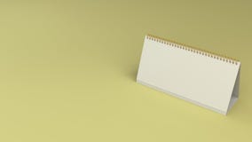 Άσπρο πρότυπο επιτραπέζιων ημερολογίων στην κίτρινη επιφάνεια στοκ φωτογραφία με δικαίωμα ελεύθερης χρήσης Άσπρο πρότυπο επιτραπέζιων ημερολογίων στην κίτρινη επιφάνεια στοκ φωτογραφία με δικαίωμα ελεύθερης χρήσης