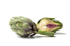 Αγκινάρες “Carciofi “στο άσπρο υπόβαθρο στοκ εικόνα Αγκινάρες “Carciofi “στο άσπρο υπόβαθρο στοκ εικόνα