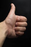 Αντίχειρες επάνω στο χέρι που απομονώνεται στο μαύρο υπόβαθρο στοκ εικόνες με δικαίωμα ελεύθερης χρήσης Αντίχειρες επάνω στο χέρι που απομονώνεται στο μαύρο υπόβαθρο στοκ εικόνες με δικαίωμα ελεύθερης χρήσης