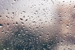 Απελευθερώσεις βροχής σε ένα παράθυρο παράθυρο ύδατος γυαλιού απελευθερώσεων Υπόβαθρο Στοκ φωτογραφία με δικαίωμα ελεύθερης χρήσης Απελευθερώσεις βροχής σε ένα παράθυρο παράθυρο ύδατος γυαλιού απελευθερώσεων Υπόβαθρο Στοκ φωτογραφία με δικαίωμα ελεύθερης χρήσης