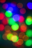 Αφηρημένο πολύχρωμο bokeh σε ένα μαύρο υπόβαθρο στοκ φωτογραφία Αφηρημένο πολύχρωμο bokeh σε ένα μαύρο υπόβαθρο στοκ φωτογραφία