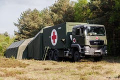 Γερμανικό κεντρικό σύστημα διάσωσης στις στάσεις φορτηγών σε ένα ξύλο στοκ εικόνες Γερμανικό κεντρικό σύστημα διάσωσης στις στάσεις φορτηγών σε ένα ξύλο στοκ εικόνες