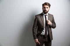 Γκρίζος τοίχος επιχειρηματιών Στοκ Φωτογραφίες Γκρίζος τοίχος επιχειρηματιών Στοκ Φωτογραφίες