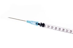 Διαφανής ιατρική σύριγγα με milliliter τα σημάδια και αιχμηρή βελόνα στο άσπρο υπόβαθρο στοκ εικόνες Διαφανής ιατρική σύριγγα με milliliter τα σημάδια και αιχμηρή βελόνα στο άσπρο υπόβαθρο στοκ εικόνες