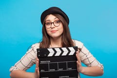 Εκμετάλλευση κοριτσιών clapperboard στοκ φωτογραφίες Εκμετάλλευση κοριτσιών clapperboard στοκ φωτογραφίες