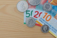 Ελβετικά τραπεζογραμμάτια και νομίσματα στοκ εικόνες με δικαίωμα ελεύθερης χρήσης Ελβετικά τραπεζογραμμάτια και νομίσματα στοκ εικόνες με δικαίωμα ελεύθερης χρήσης