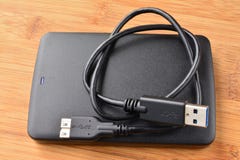Εξωτερικό USB 3 σκληρός δίσκος 0 και καλώδιο στοκ φωτογραφίες Εξωτερικό USB 3 σκληρός δίσκος 0 και καλώδιο στοκ φωτογραφίες