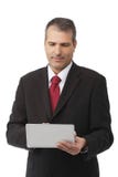 Επιχειρηματίας που κρατά το lap-top του στοκ εικόνα Επιχειρηματίας που κρατά το lap-top του στοκ εικόνα