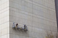 Εργαζόμενοι που αναστέλλονται σε ένα κτήριο, Μανχάταν Στοκ Φωτογραφίες Εργαζόμενοι που αναστέλλονται σε ένα κτήριο, Μανχάταν Στοκ Φωτογραφίες