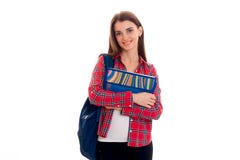 Εύθυμο μοντέρνο έξυπνο κορίτσι σπουδαστών με το σακίδιο πλάτης στους ώμους και τους φακέλλους της για τα σημειωματάρια στα χέρια Στοκ φωτογραφίες με δικαίωμα ελεύθερης χρήσης Εύθυμο μοντέρνο έξυπνο κορίτσι σπουδαστών με το σακίδιο πλάτης στους ώμους και τους φακέλλους της για τα σημειωματάρια στα χέρια Στοκ φωτογραφίες με δικαίωμα ελεύθερης χρήσης