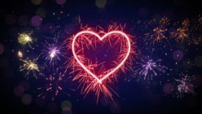 Ζωτικότητα μορφής καρδιών Sparkler και βρόχων πυροτεχνημάτων 4k (4096x2304) απεικόνιση αποθεμάτων Ζωτικότητα μορφής καρδιών Sparkler και βρόχων πυροτεχνημάτων 4k (4096x2304) απεικόνιση αποθεμάτων