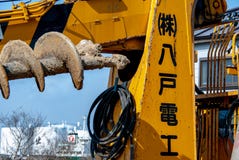 Ιαπωνικός digger για την εγκατάσταση της ηλεκτρικής τηλεγράφησης στοκ εικόνες με δικαίωμα ελεύθερης χρήσης Ιαπωνικός digger για την εγκατάσταση της ηλεκτρικής τηλεγράφησης στοκ εικόνες με δικαίωμα ελεύθερης χρήσης