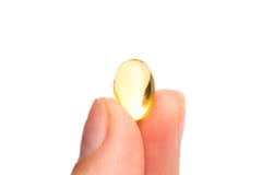 Κάψα εκμετάλλευσης χεριών Omega 3 στο άσπρο υπόβαθρο o στοκ εικόνες Κάψα εκμετάλλευσης χεριών Omega 3 στο άσπρο υπόβαθρο o στοκ εικόνες