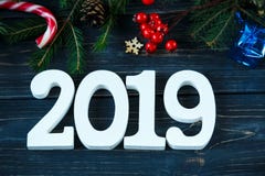 2019, κλάδοι του δέντρου έλατου, ντεκόρ στον γκρίζο ξύλινο πίνακα Νέος κατάλογος στόχων έτους, πράγματα που κάνουν στα Χριστούγεν στοκ φωτογραφία με δικαίωμα ελεύθερης χρήσης 2019, κλάδοι του δέντρου έλατου, ντεκόρ στον γκρίζο ξύλινο πίνακα Νέος κατάλογος στόχων έτους, πράγματα που κάνουν στα Χριστούγεν στοκ φωτογραφία με δικαίωμα ελεύθερης χρήσης