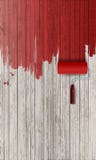 Κόκκινο χρώμα στο ξύλινο υπόβαθρο Κόκκινο χρώμα στο ξύλινο υπόβαθρο