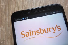 Λογότυπο Sainsbury που επιδεικνύεται σε ένα σύγχρονο smartphone στοκ φωτογραφία με δικαίωμα ελεύθερης χρήσης Λογότυπο Sainsbury που επιδεικνύεται σε ένα σύγχρονο smartphone στοκ φωτογραφία με δικαίωμα ελεύθερης χρήσης