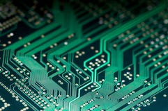 Μακροεντολή του ηλεκτρονικού PCB πινάκων κυκλωμάτων σε πράσινο στοκ φωτογραφίες Μακροεντολή του ηλεκτρονικού PCB πινάκων κυκλωμάτων σε πράσινο στοκ φωτογραφίες