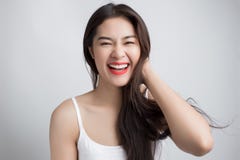 Νέα όμορφη ασιατική γυναίκα με το πρόσωπο smiley στοκ φωτογραφίες Νέα όμορφη ασιατική γυναίκα με το πρόσωπο smiley στοκ φωτογραφίες
