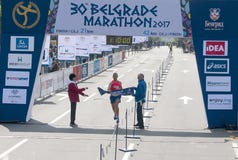 Νικητής του μισού μαραθωνίου για τα άτομα στοκ φωτογραφία με δικαίωμα ελεύθερης χρήσης Νικητής του μισού μαραθωνίου για τα άτομα στοκ φωτογραφία με δικαίωμα ελεύθερης χρήσης