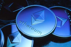 Νομίσματα Ethereum με την μπλε απόχρωση στοκ φωτογραφία με δικαίωμα ελεύθερης χρήσης Νομίσματα Ethereum με την μπλε απόχρωση στοκ φωτογραφία με δικαίωμα ελεύθερης χρήσης