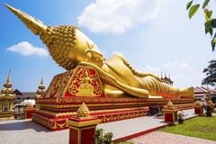 Ξαπλώνοντας το άγαλμα του Βούδα σε Wat Pha που Luang, Vientiane, Λάος Στοκ Εικόνα Ξαπλώνοντας το άγαλμα του Βούδα σε Wat Pha που Luang, Vientiane, Λάος Στοκ Εικόνα