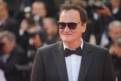Ο Quentin Tarantino παρευρίσκεται στην τελετή κλεισίματος στοκ φωτογραφία Ο Quentin Tarantino παρευρίσκεται στην τελετή κλεισίματος στοκ φωτογραφία