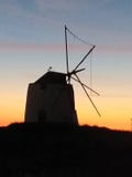Ο ανεμόμυλος στοκ φωτογραφία με δικαίωμα ελεύθερης χρήσης Ο ανεμόμυλος στοκ φωτογραφία με δικαίωμα ελεύθερης χρήσης