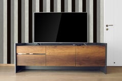 Οδηγημένη TV στη στάση TV στο κενό δωμάτιο με το εκλεκτής ποιότητας γραπτό wa στοκ εικόνα με δικαίωμα ελεύθερης χρήσης Οδηγημένη TV στη στάση TV στο κενό δωμάτιο με το εκλεκτής ποιότητας γραπτό wa στοκ εικόνα με δικαίωμα ελεύθερης χρήσης