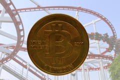Πραγματικό bitcoin με το ρόλερ κόστερ στο υπόβαθρο στοκ εικόνες Πραγματικό bitcoin με το ρόλερ κόστερ στο υπόβαθρο στοκ εικόνες