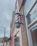 Πόλη Barbershop στοκ φωτογραφία με δικαίωμα ελεύθερης χρήσης Πόλη Barbershop στοκ φωτογραφία με δικαίωμα ελεύθερης χρήσης