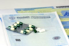 Ρωσία Κινηματογράφηση σε πρώτο πλάνο, η ρωσική πολιτική της υποχρεωτικής ασφάλειας υγείας και άδεια για λόγους υγείας με τις σφρα στοκ φωτογραφία Ρωσία Κινηματογράφηση σε πρώτο πλάνο, η ρωσική πολιτική της υποχρεωτικής ασφάλειας υγείας και άδεια για λόγους υγείας με τις σφρα στοκ φωτογραφία